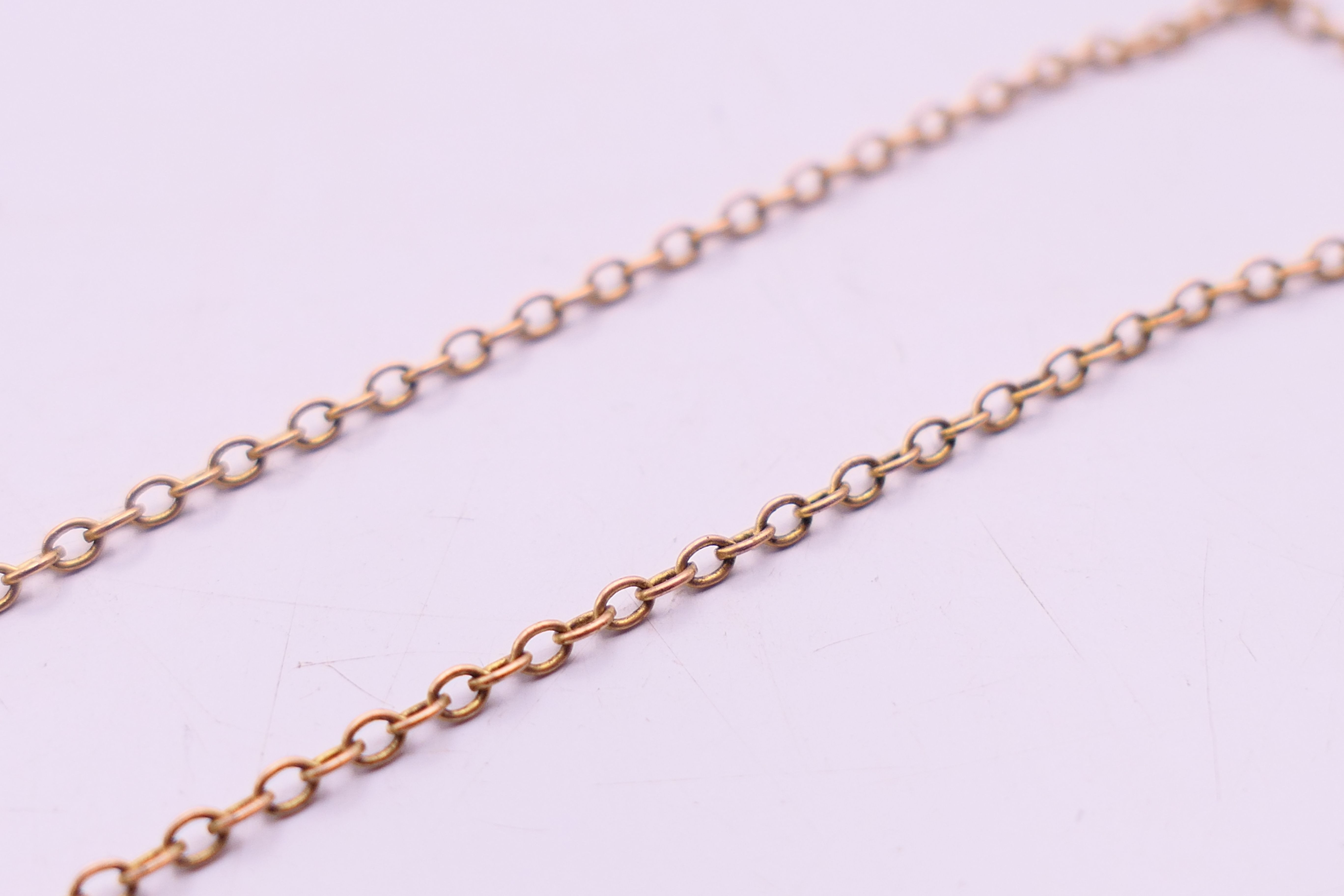 A 1900 sovereign pendant on a 9 ct gold chain. Pendant 2.3 cm diameter, chain 60 cm long. 12. - Image 4 of 5