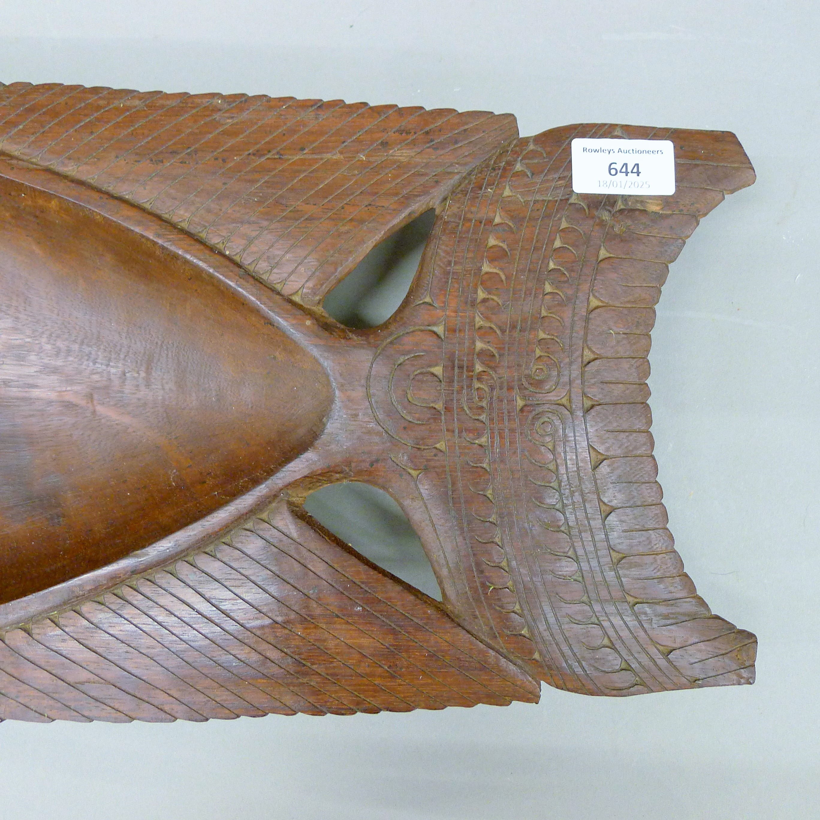 A large Solomon Islands wood bowl in the form of a fish with shell eye. 77 cm long. - Image 3 of 4