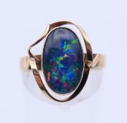 A 9 ct gold and opal ring. Ring size P/Q.