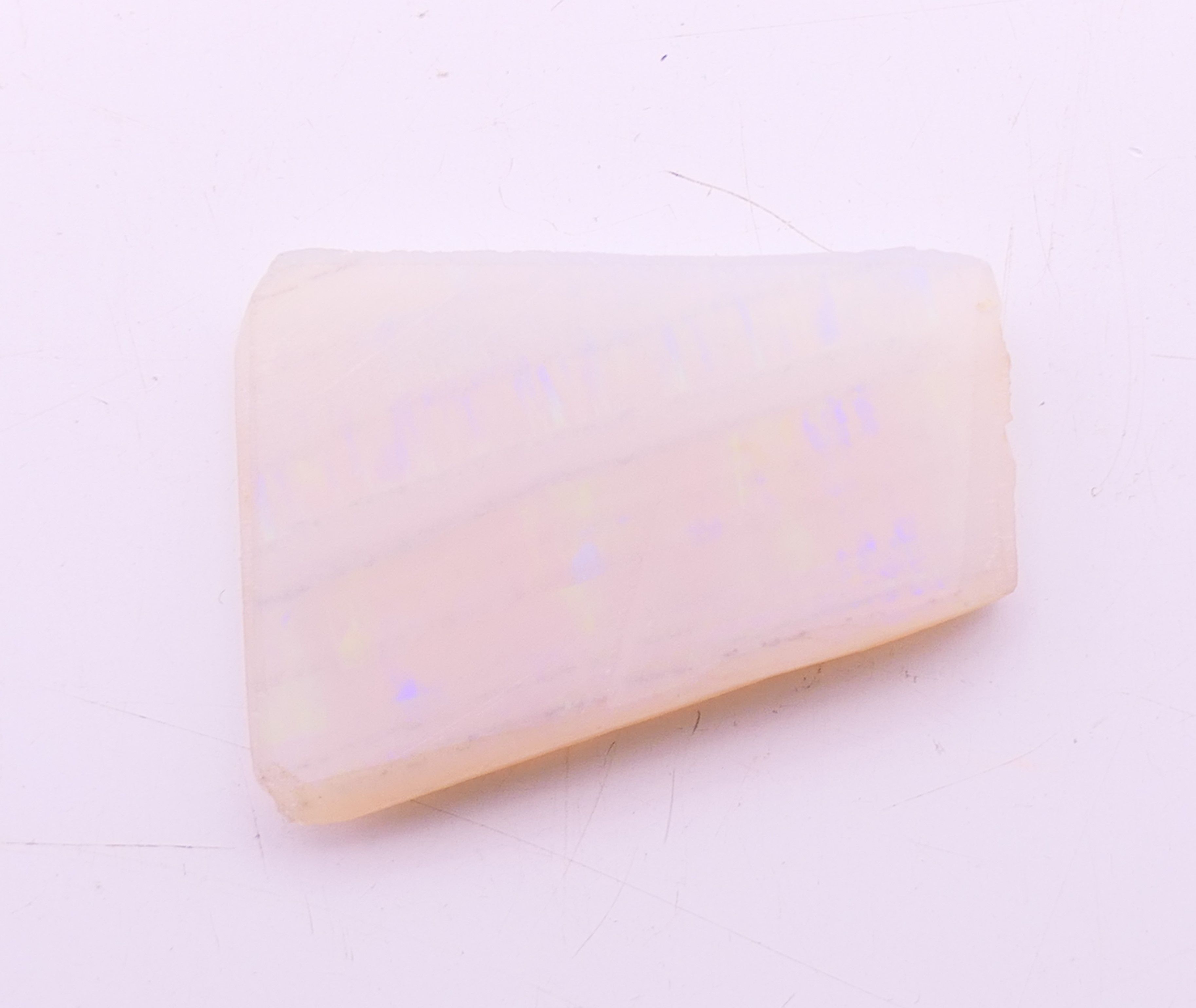 Two loose black opals and a white opal. Black opals 2 cm high and 1.5 cm high, white opal 2 cm x 1. - Image 7 of 8