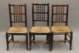 Three 19th century ash and rush chairs. 46 cm wide.
