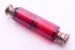 A Victorian ruby glass double ended scent bottle. 12.5 cm long.