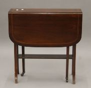 An Edwardian inlaid mahogany Sutherland table. 18 cm wide with flaps down.