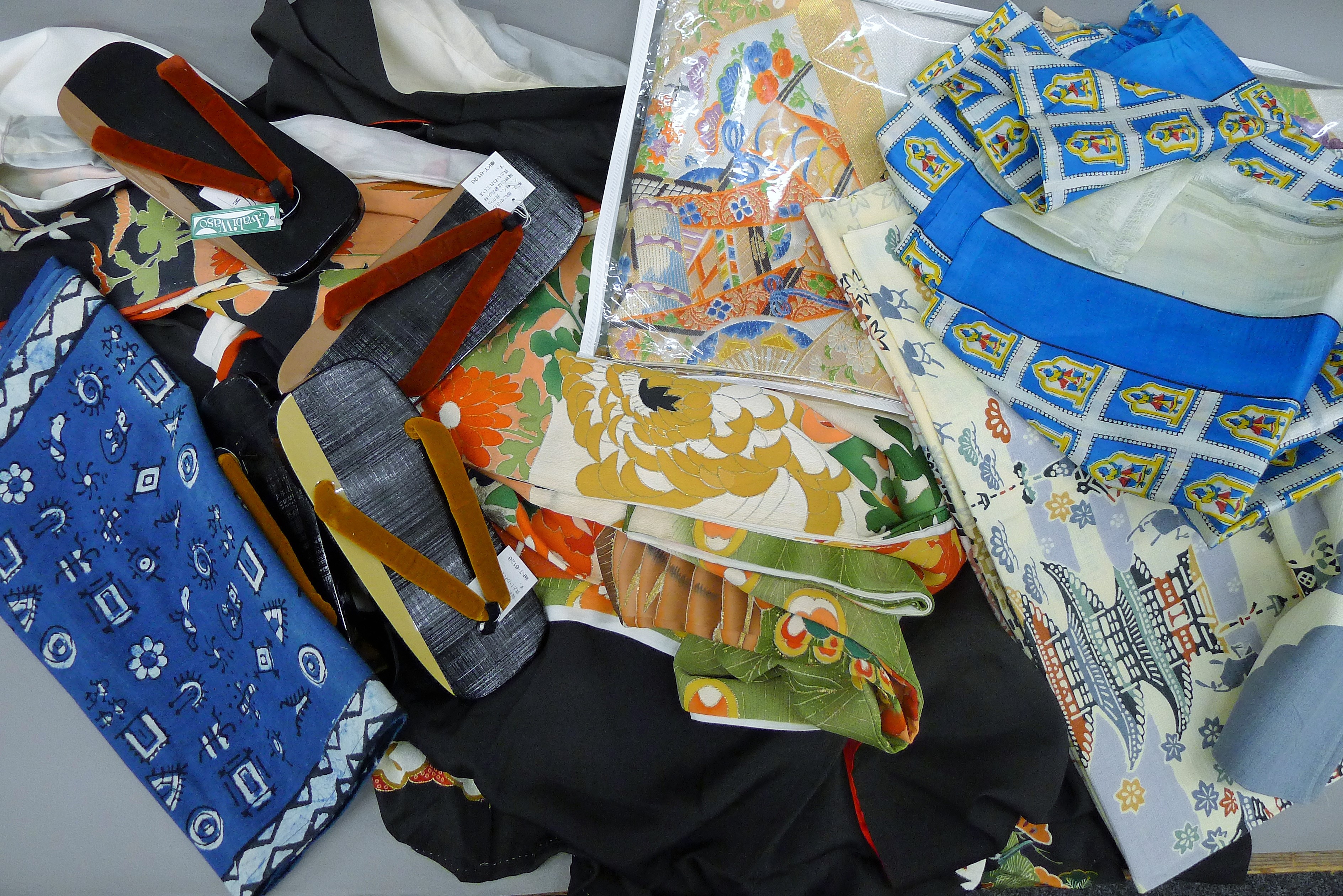 A quantity of various Japanese silk kimonos, shoes, etc.