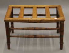 A Victorian oak luggage stand. 68.5 cm long.