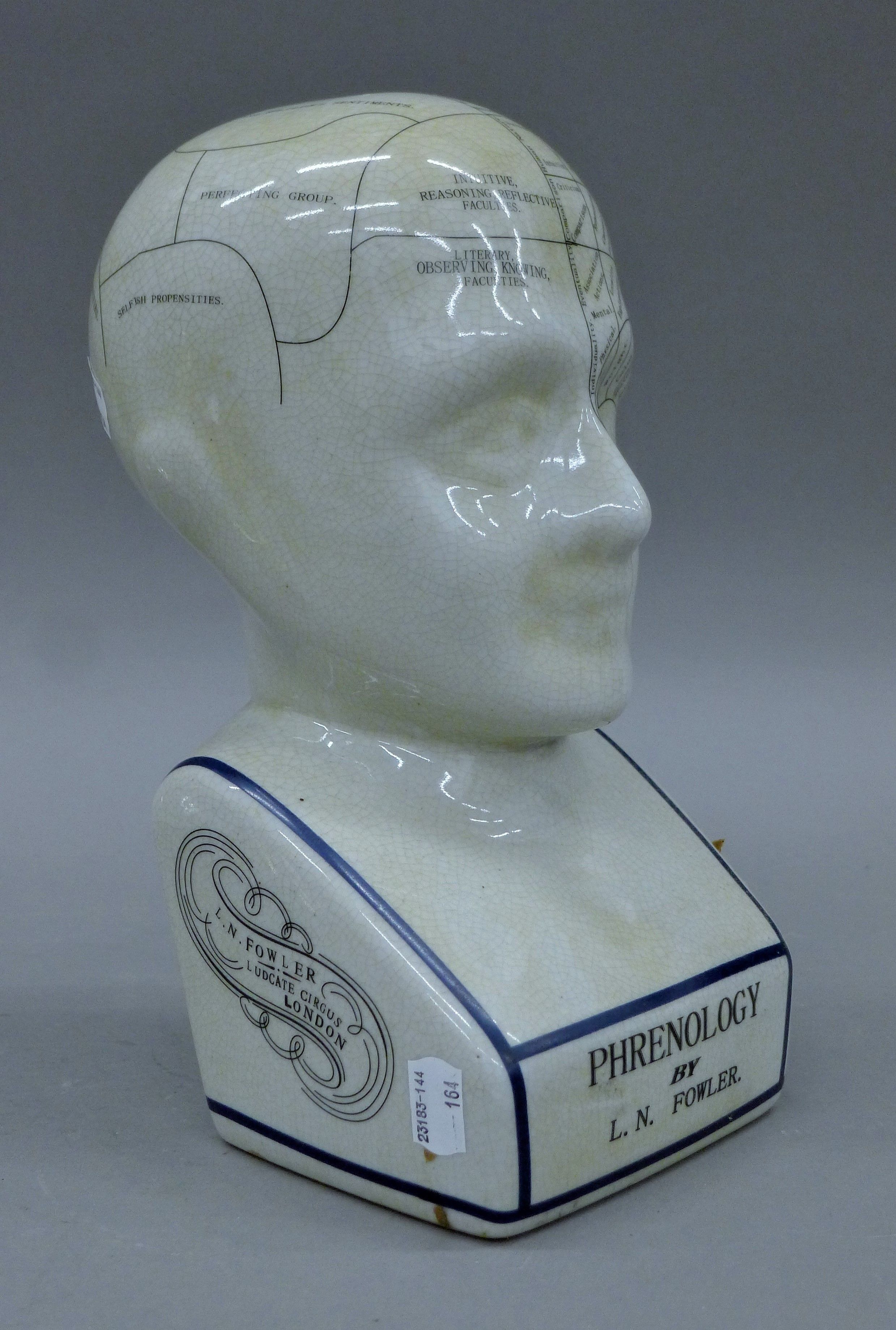 A porcelain phrenology head. 29 cm high. - Image 2 of 4