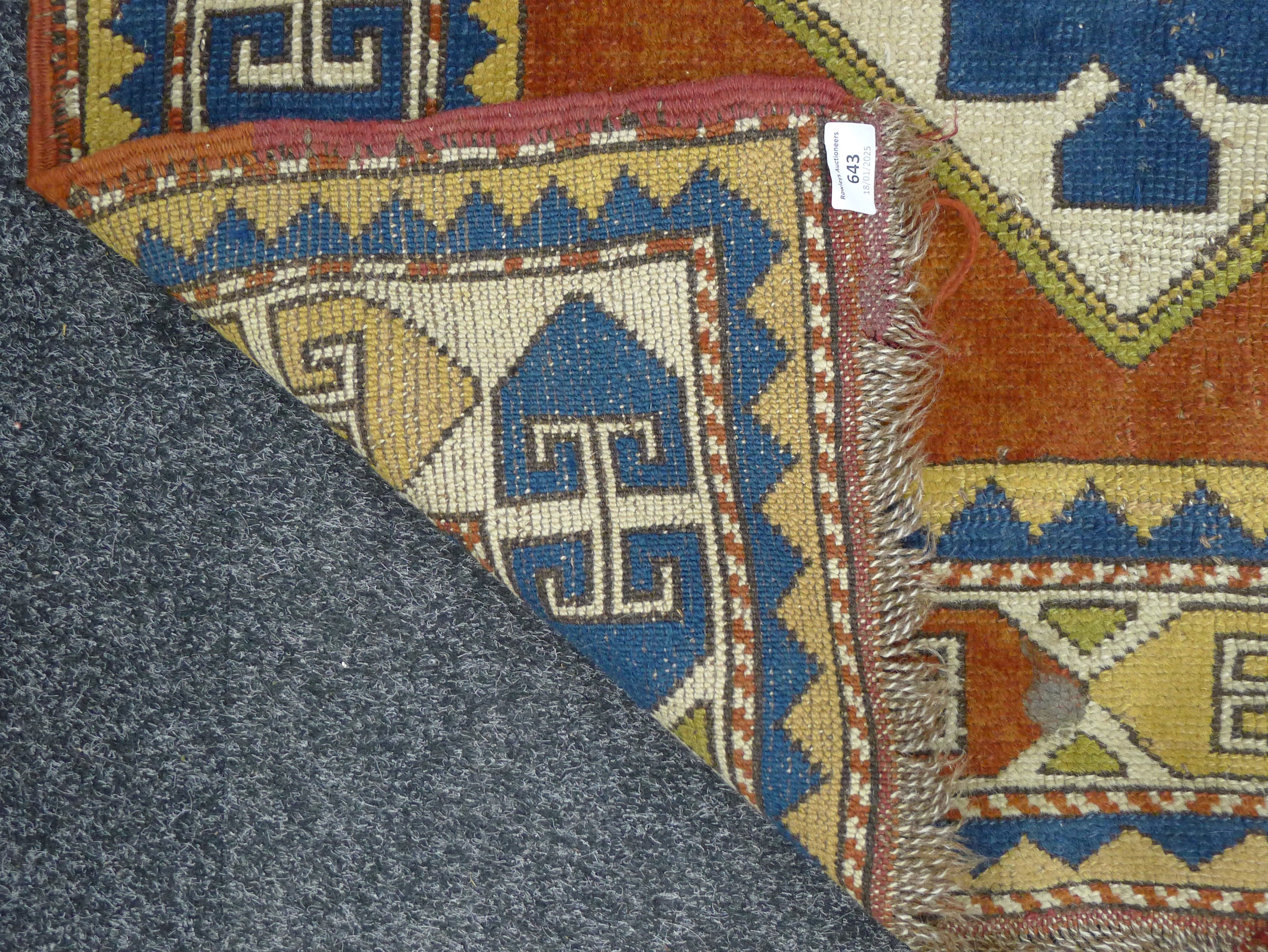 An Eastern red ground rug. 95 x 140 cm. - Image 3 of 6