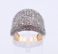 A 9 ct gold multi-stone diamond ring.