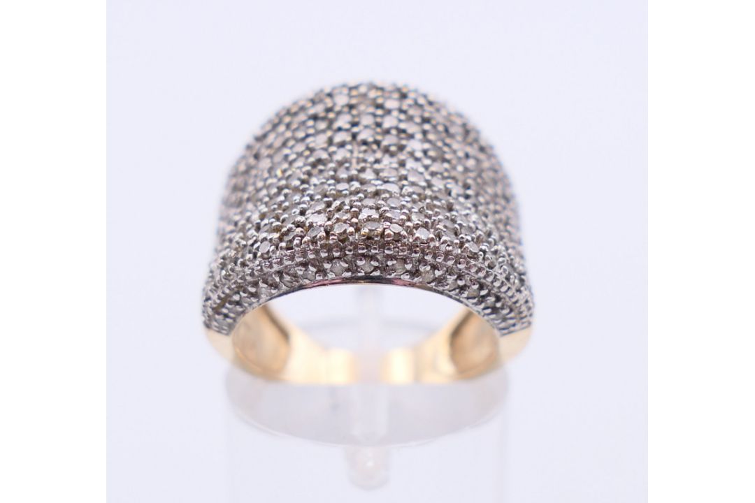A 9 ct gold multi-stone diamond ring. - Image 1 of 6