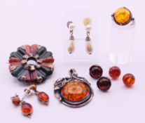 A quantity of silver jewellery to include: earrings, an Art Nouveau style pendant,