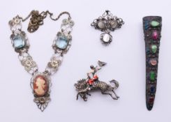 A small quantity of various silver jewellery to include: a Chinese filigree fingernail gourd brooch,