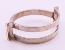 A Georg Jensen silver bangle (design no.
