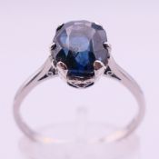 A platinum and sapphire ring. Ring size P/Q.