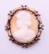 A Victorian cameo brooch, possibly 15 ct gold. 4.5 cm high.