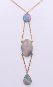 A three drop opal necklace. Necklace 36 cm long, middle opal 1.75 cm high.