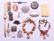A quantity of various jewellery to include necklaces, brooches, an Ingersoll ladies wristwatch,