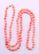 A coral bead necklace. 96 cm long.