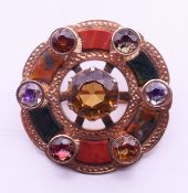 An unmarked 9 ct gold Scottish brooch. 3.5 cm diameter.