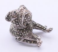 A marcasite-set swivel head bulldog brooch. 3 cm high.