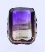 A silver and ametrine ring. Ring size P/Q.