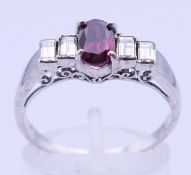 A 14 K white gold, diamond and ruby (0.
