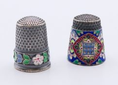 Two silver and enamel thimbles. Each 2.25 cm high.