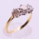 An 18 ct gold three stone diamond ring. Ring size P. - Image 3 of 5