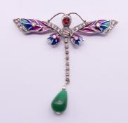 A silver plique-a-jour dragonfly brooch. 6.5 cm high x 7 cm wide.