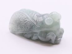 A carved jade cicada. 3.5 cm long.