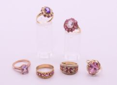 Six 9 ct gold dress rings. 21.2 grammes total weight.