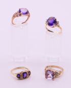 Four 9 ct gold diamond and amethyst rings. 12.5 grammes total weight.