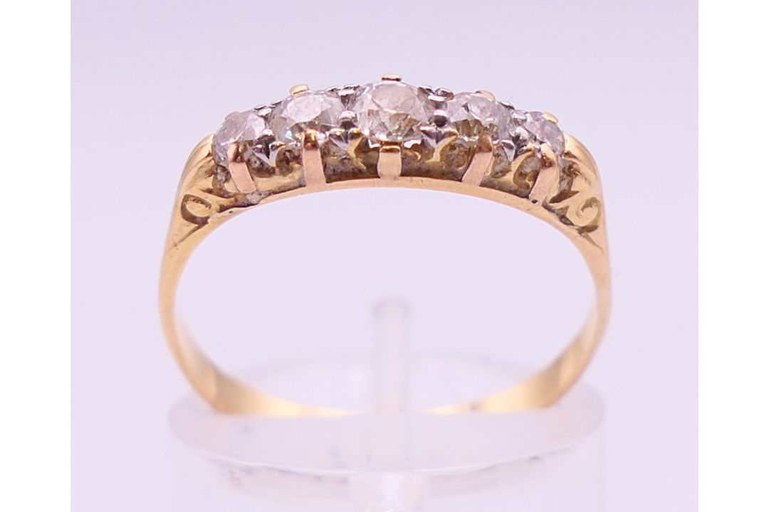 An 18 ct gold five-stone diamond ring. Ring size P/Q. - Image 1 of 5