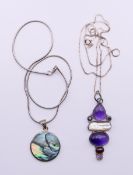 Two silver pendant necklaces. Abalone shell pendant 2.