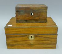 A 19th century rosewood tea caddy and a walnut box. The former 18.5 cm wide.