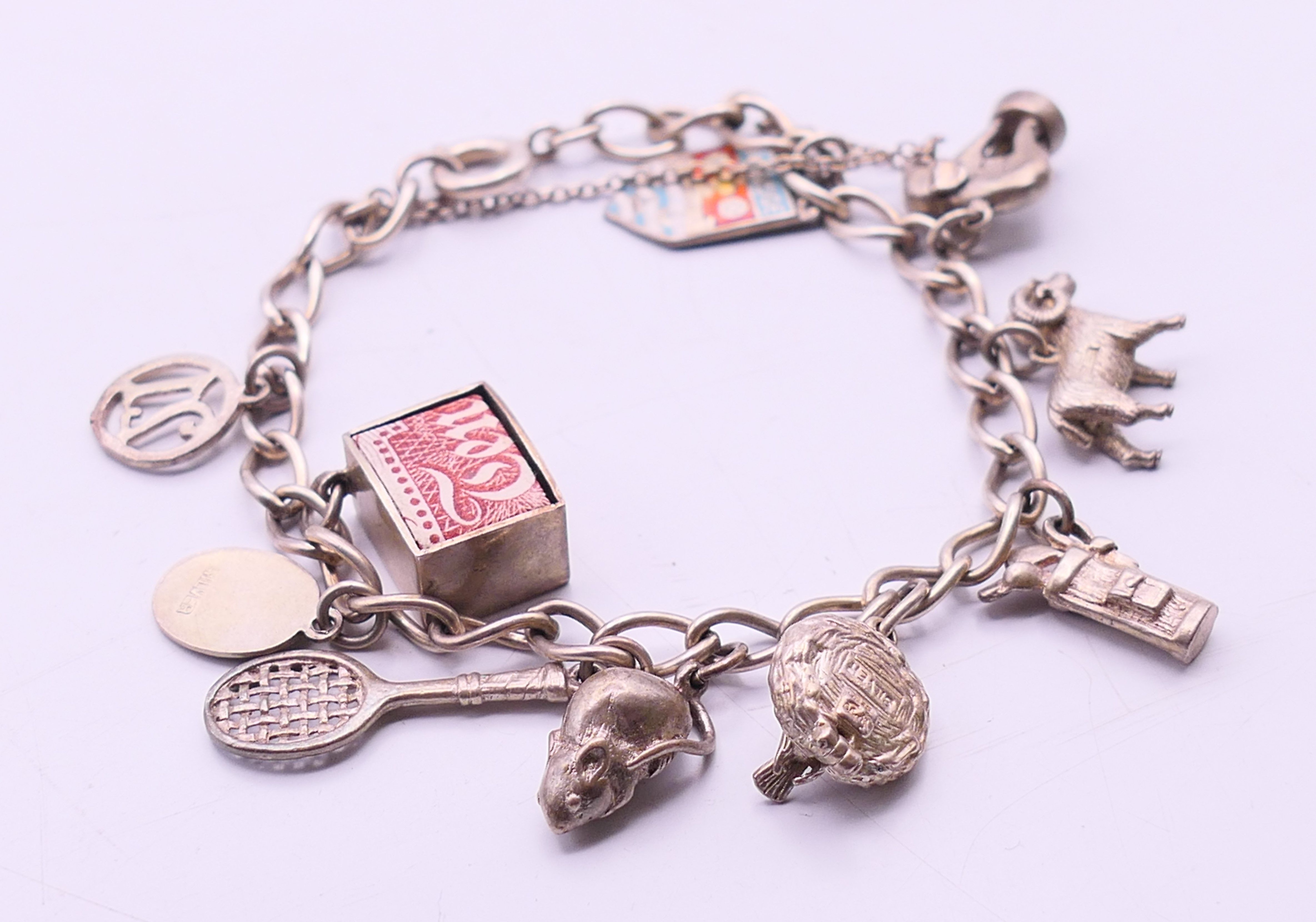 A silver charm bracelet and a silver necklace. The later 34 cm long. - Image 6 of 9