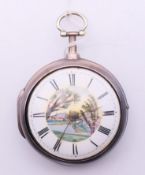A silver pair cased verge pocket watch with painted enamel dial. Pocket watch 4.75 cm diameter.