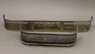 Two 19th century brass fenders and a quantity of fire irons etc. The larger fender 130 cm.