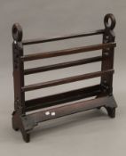 A Victorian Gothic-style boot rack. 73 cm wide.