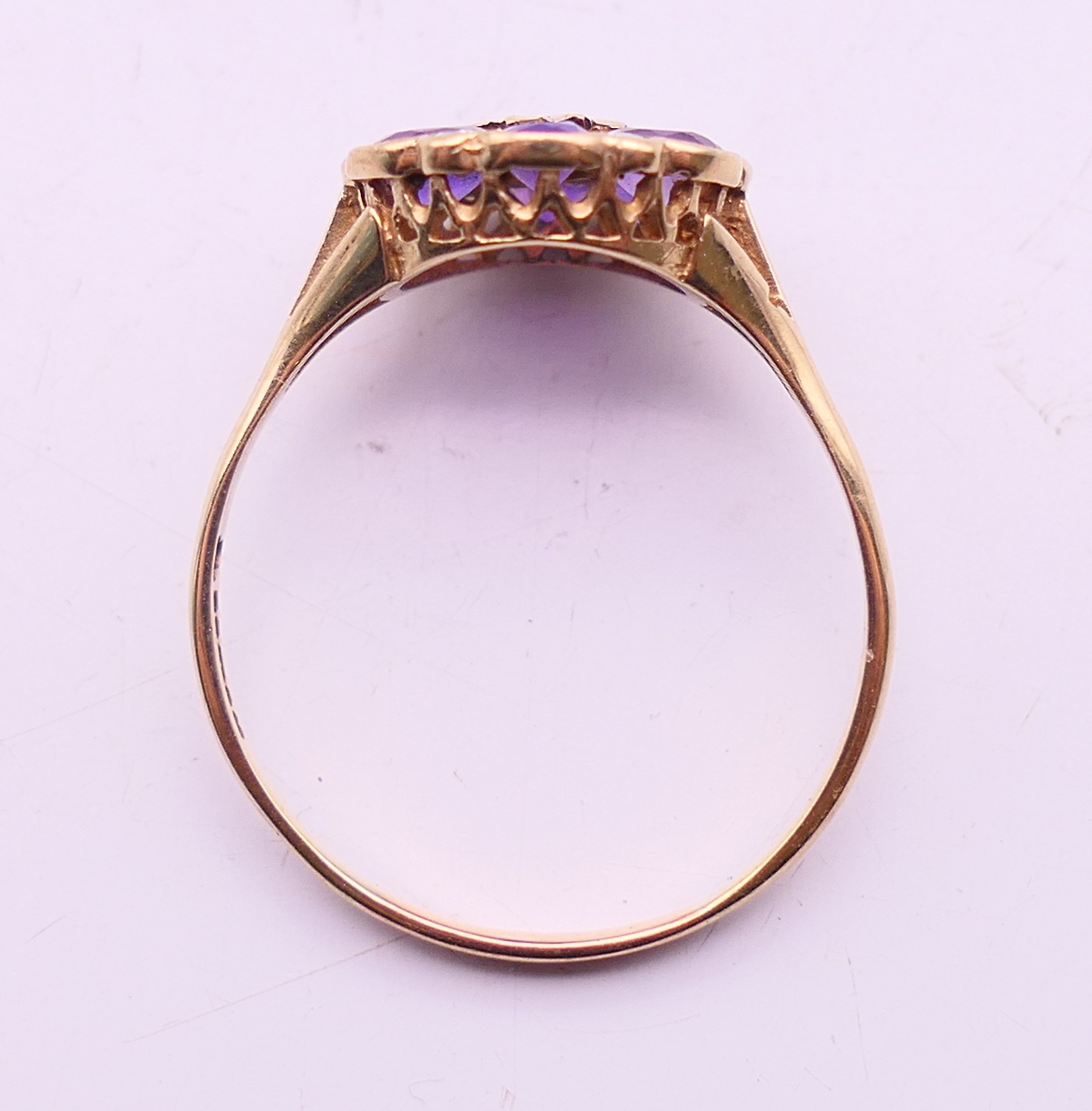 A 9 ct gold, amethyst and diamond cluster ring. Ring size U. - Image 5 of 5