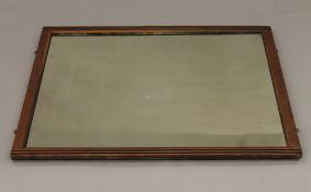 A Victorian mahogany-framed mirror. 76 x 101 cm.