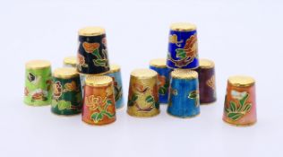 Twelve cloisonne thimbles. Each 2.5 cm high.