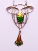 A silver Art Nouveau style pendant. 9 cm high.