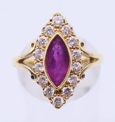 An 18 ct gold, diamond and ruby navette ring. Ring size P.