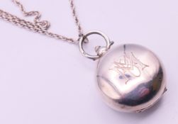 A silver sovereign holder on a sterling silver chain.