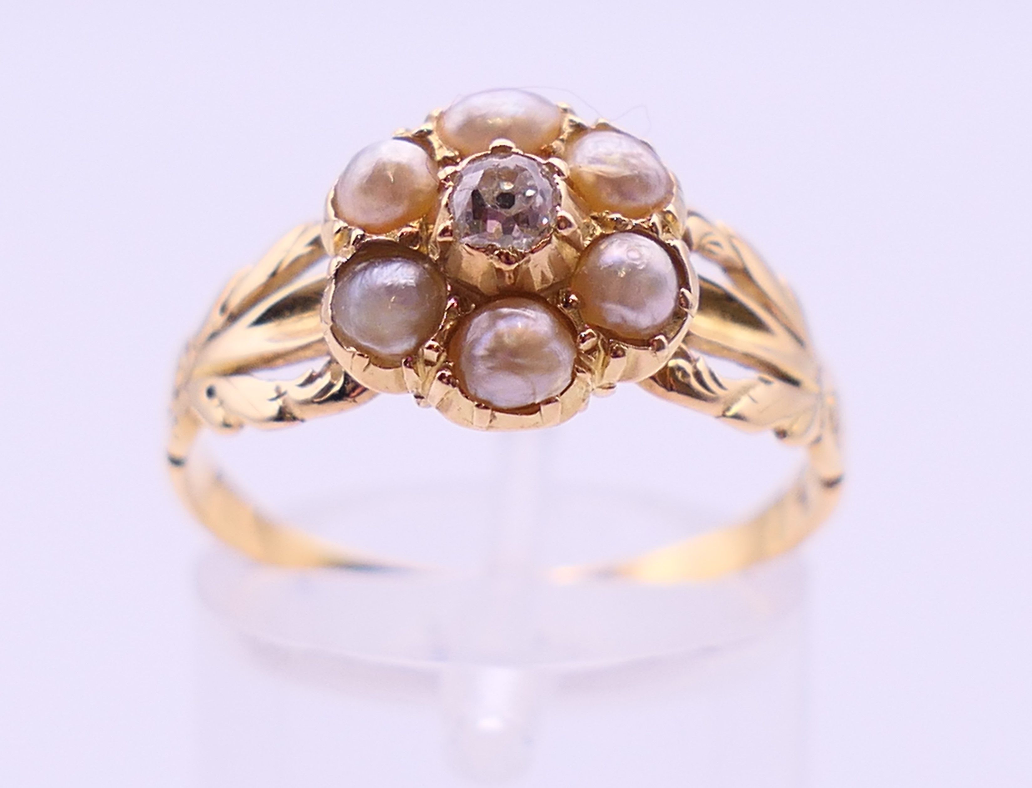 An unmarked gold, diamond and seed pearl ring, and another unmarked gold and seed pearl ring. - Image 8 of 11