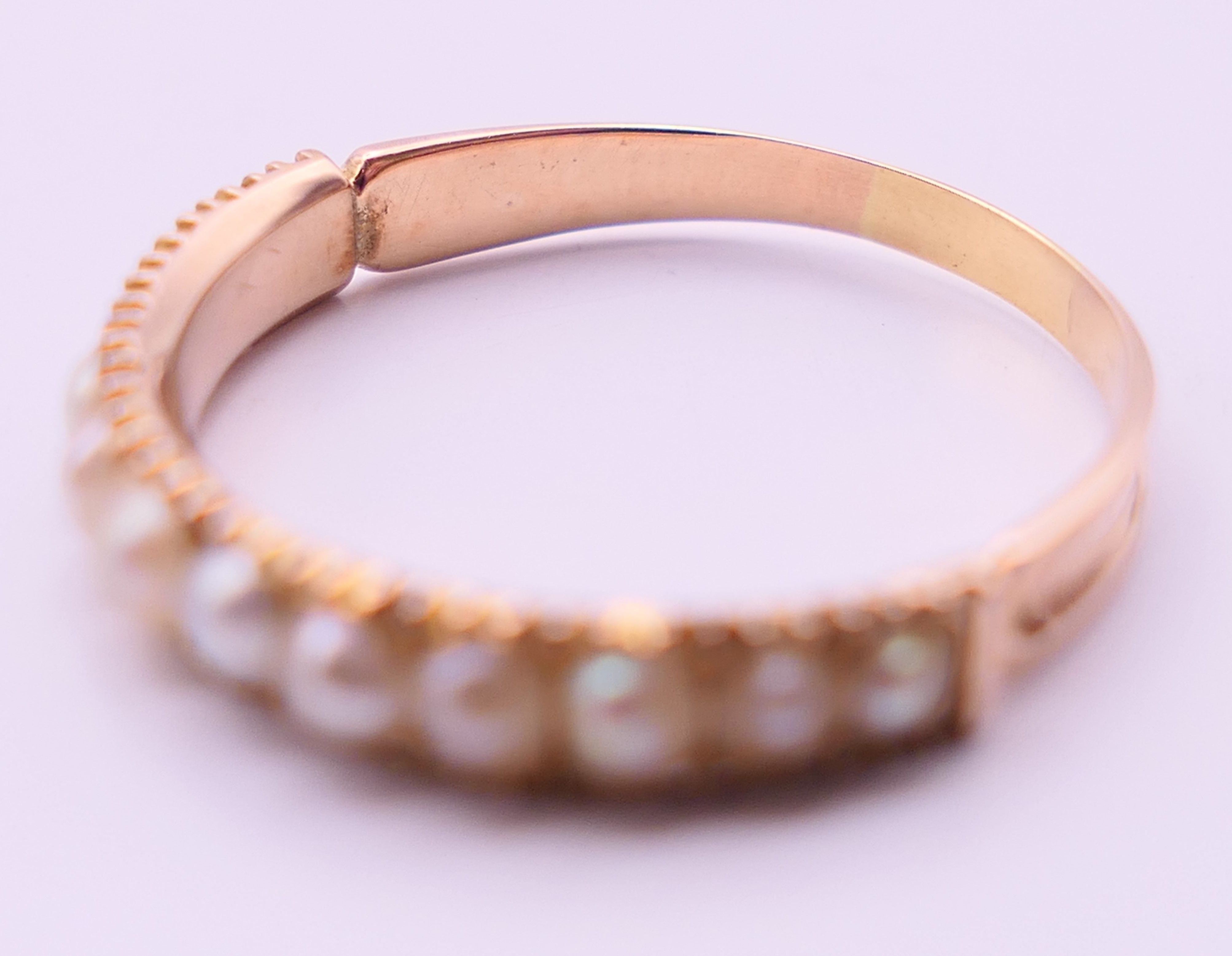 An unmarked gold, diamond and seed pearl ring, and another unmarked gold and seed pearl ring. - Image 5 of 11