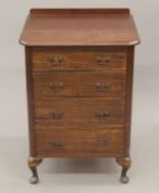 A small mahogany chest of drawers. 55 cm wide, 77 cm high.