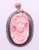 A cameo pendant. 5.5 cm high excluding suspension loop.
