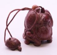 A turtle inro. 8 cm high.