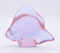 A Lalique pink glass fish, marked Lalique France and with label numbered 30017. 4.5 cm high, 5.